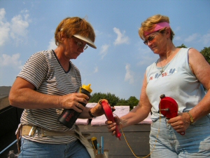 Sandy and Judy fill Double Chalkers® with Magichalk®