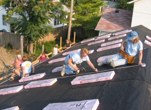 Judy and Brenda install THOR® Roofing Layout Tapes