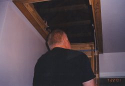 Inspector entering the attic